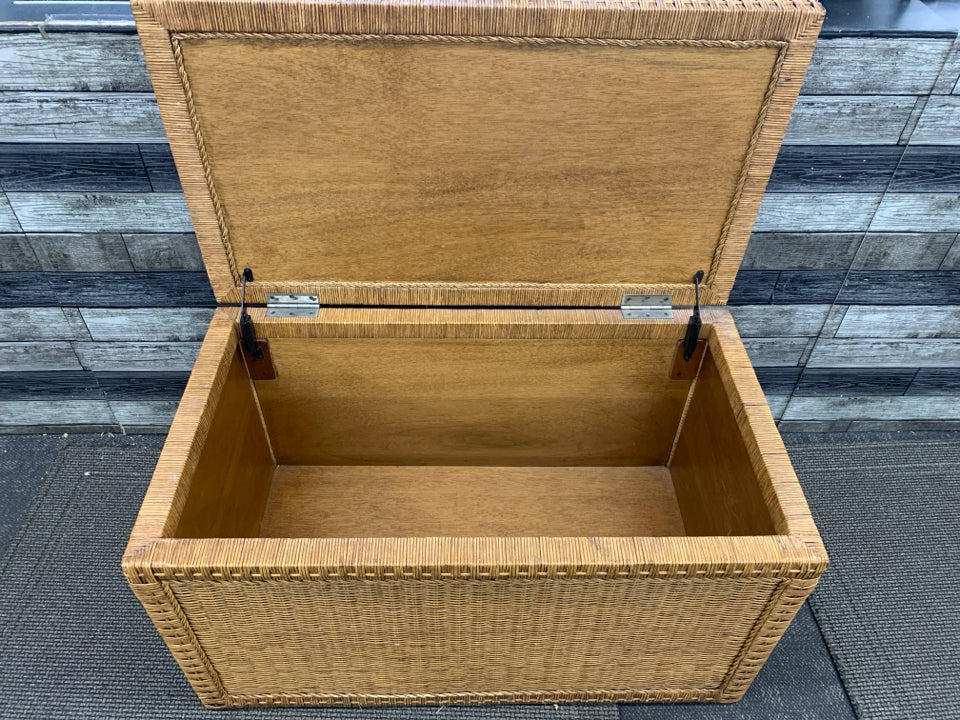 WICKER STORAGE CHEST W/METAL HANDLES.