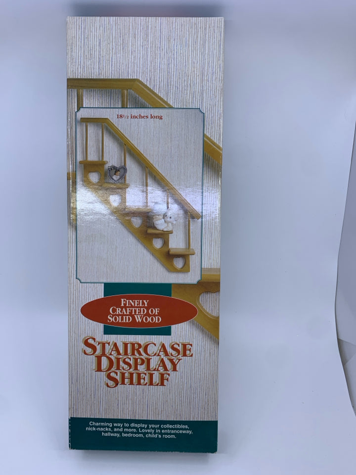 NIB STAIRCASE DISPLAY SHELF.