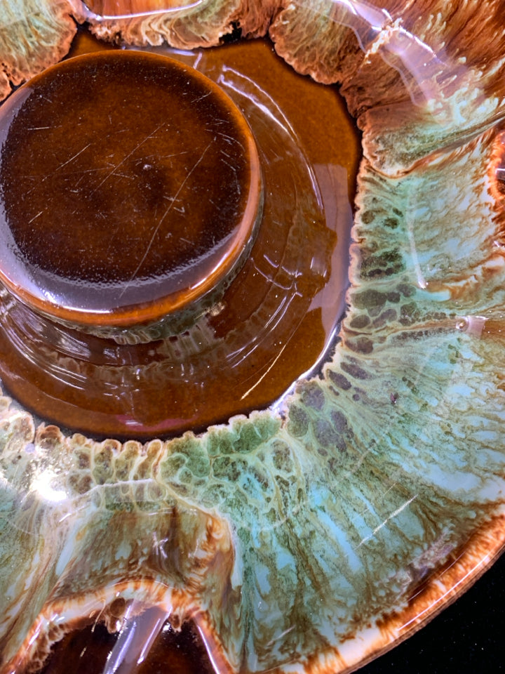 VTG DARK BROWN W/ GREEN DRIP GLAZED ASHTRAY.