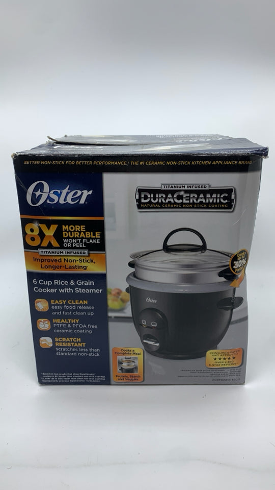 NIB OSTER RICE/GRAIN COOKER.