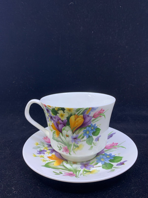 LARGE TEACUP AND SAUCER W/ PURPLE AND ORANGE FLOWERS.