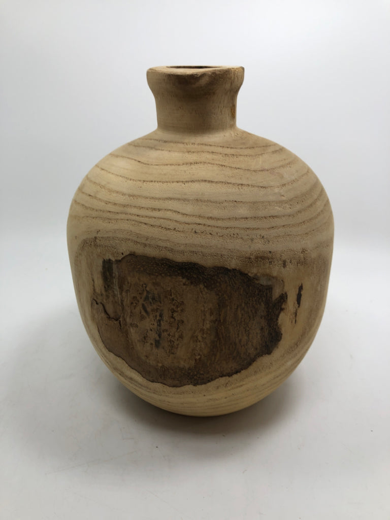 NATURAL CARVED WOOD VASE.