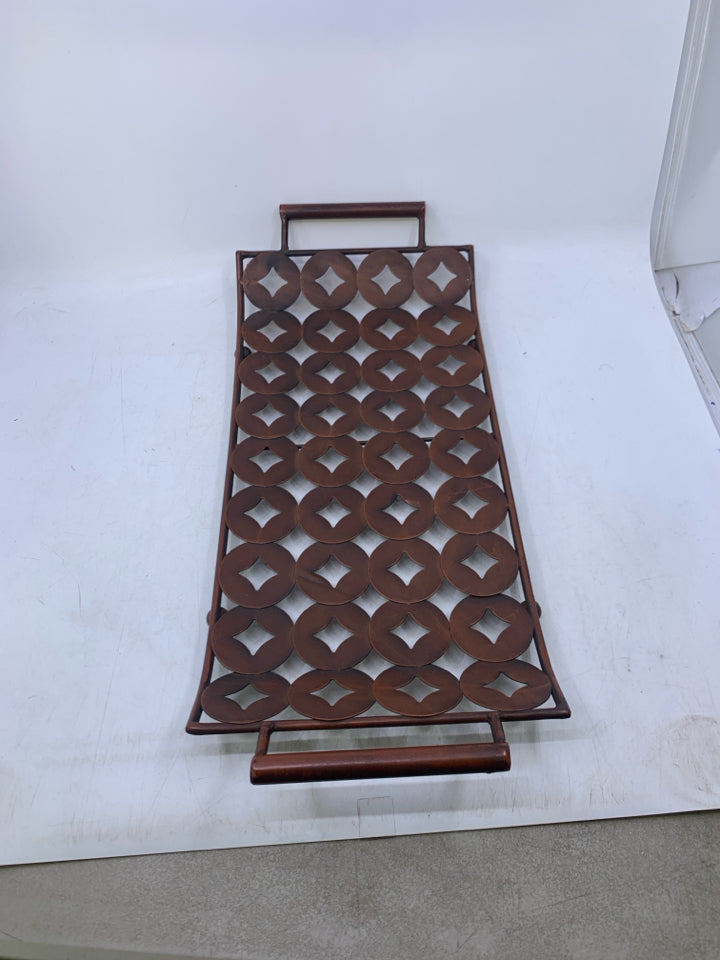 BROWN FOOTED METAL TRAY W/ LIFTED EDGES PIERCED CIRCLES.