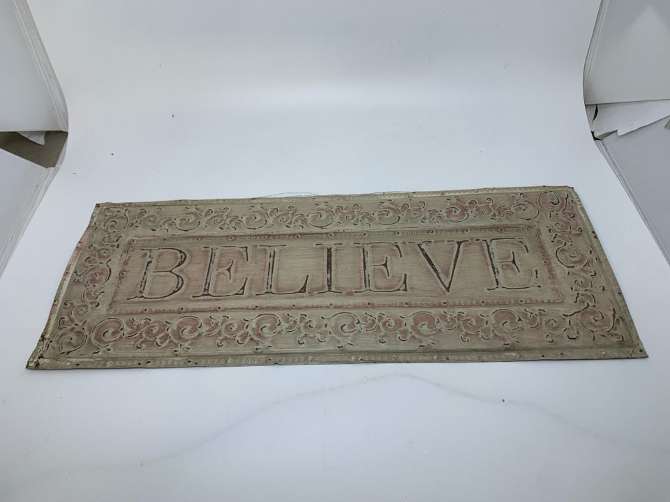 METAL DISTRESSED "bELIEVE" SCROLL EDGE SIGN.
