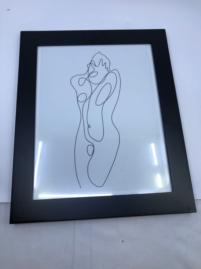 ABSTRACT WOMAN SCRIBBLE IN BLACK FRAME.