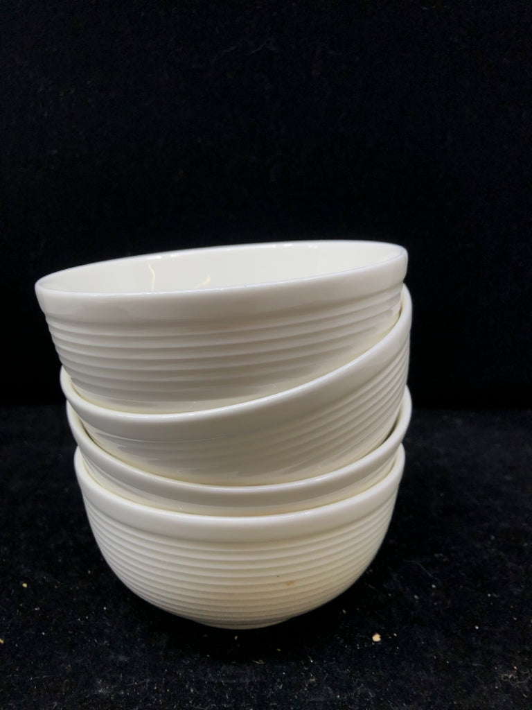 4 SMALL WHITE RIBBED BOWLS.