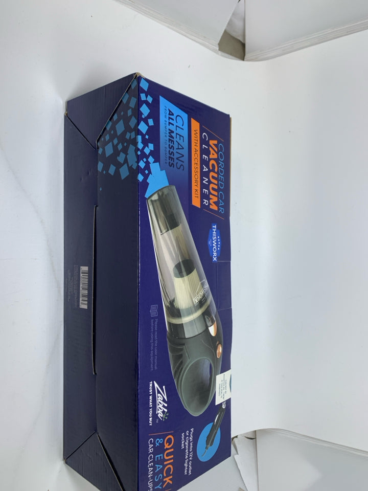 NIB CORED CAR VACUUM CLEANER.