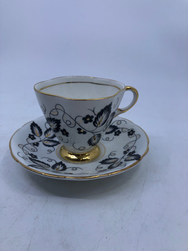 BLACK/GOLD LEAVES TEACUP/SAUCER CLARENCE.