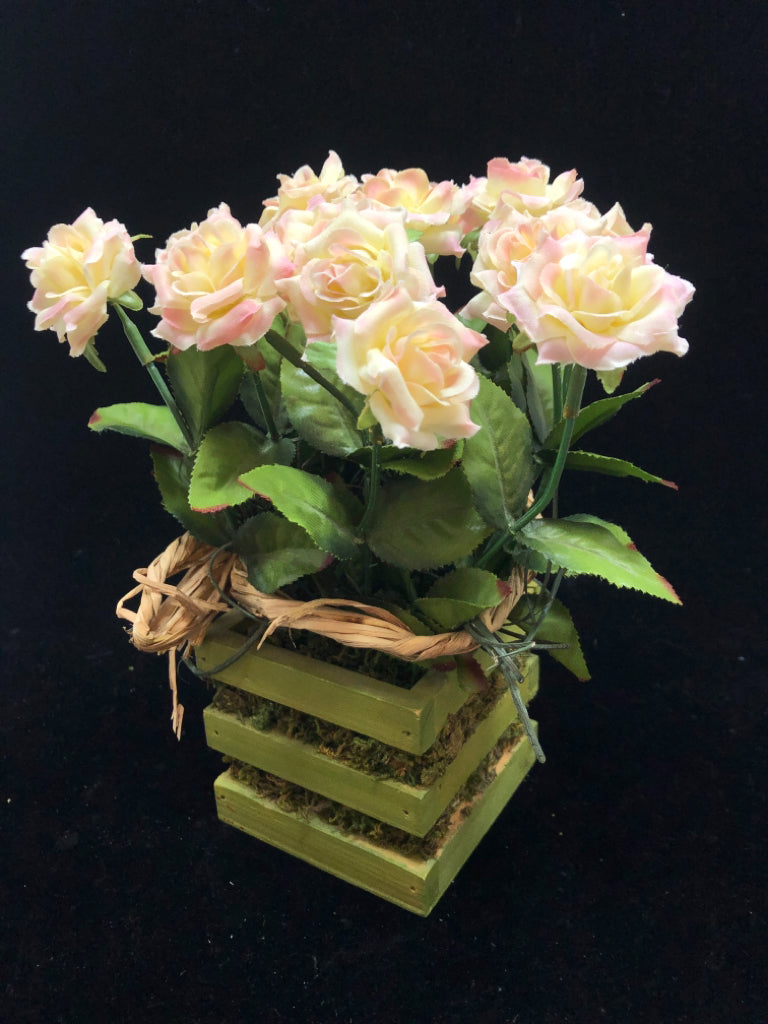 FAUX FLORAL W/GREEN WOODEN BASE.