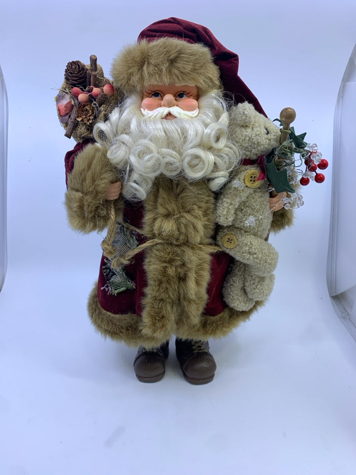 SANTA IN RED AND BROWN COAT W TEDDY BEAR.
