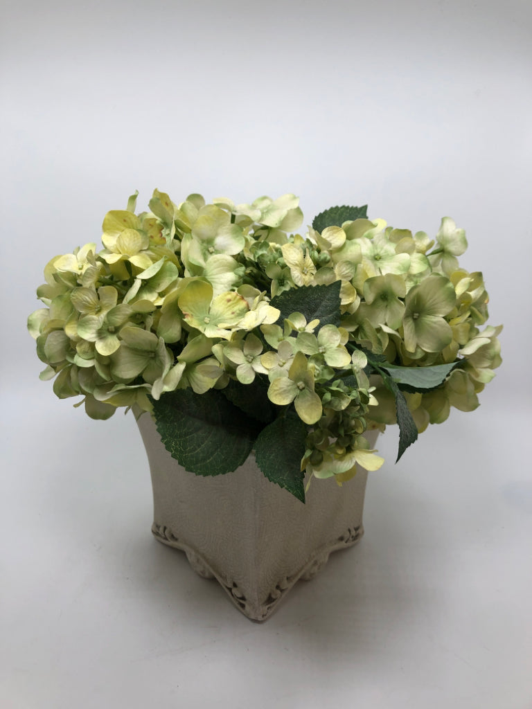 GREEN FLORALS IN WHITE PLANTER W/CRAZING.