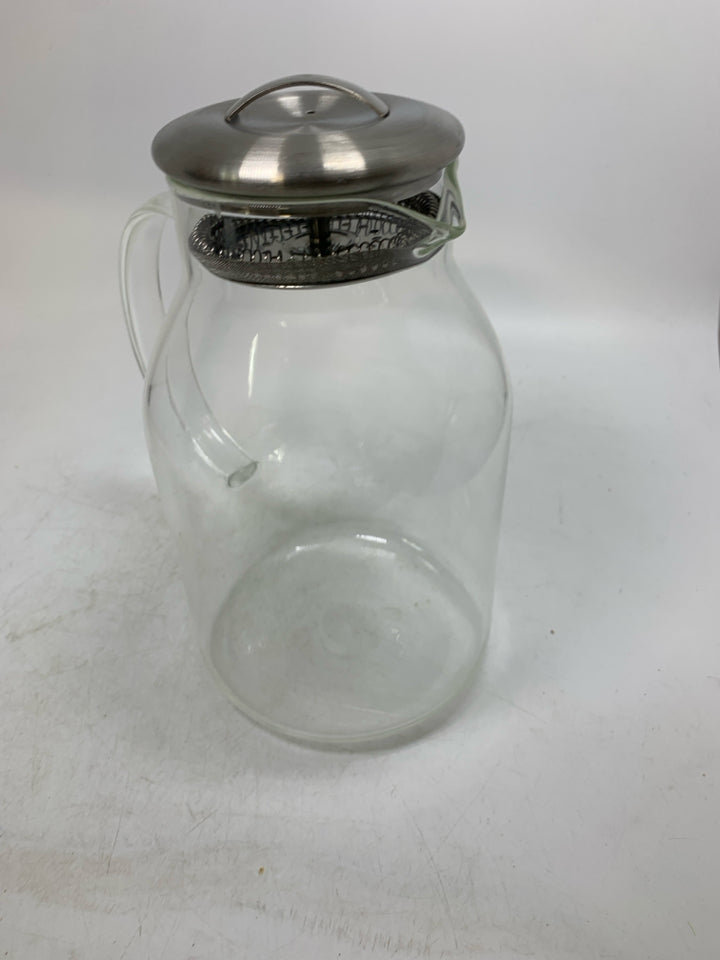 CLEAR GLASS PITCHER W/ METAL TOP.