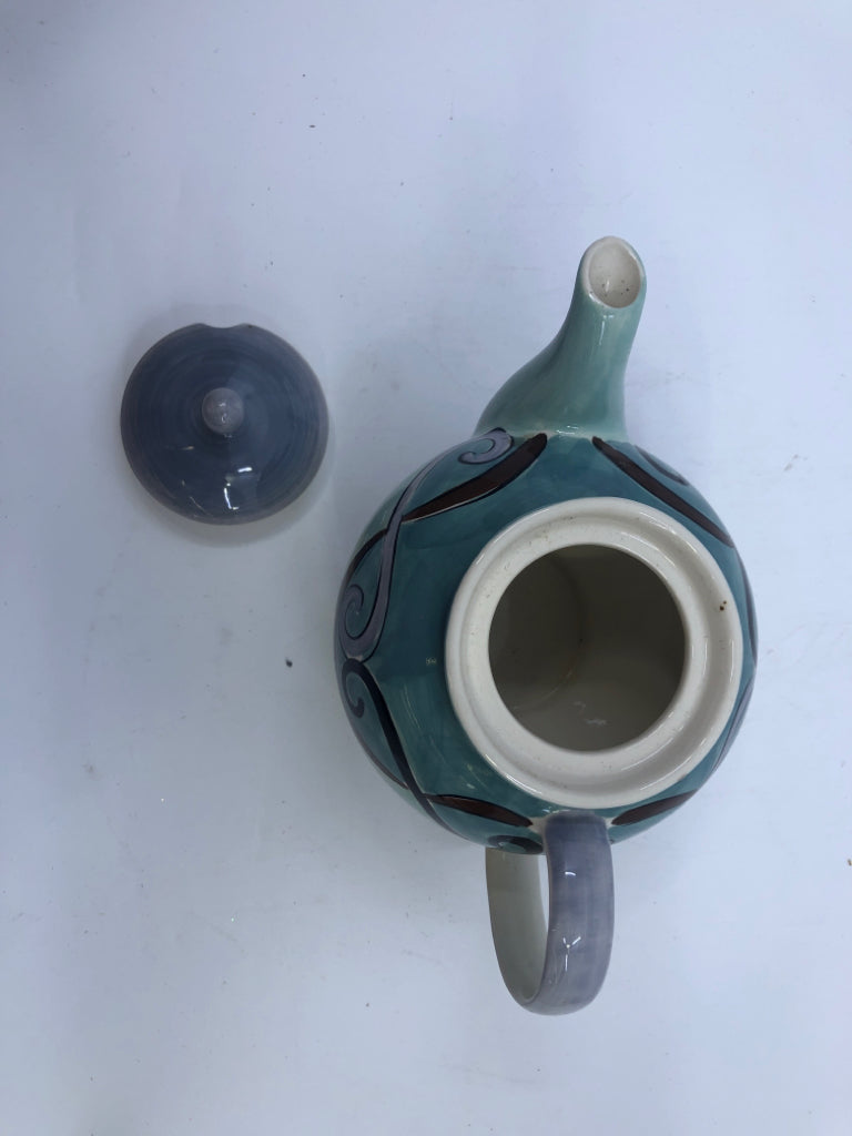 TEAL TEAPOT W/PURPLE PAINTED LID.