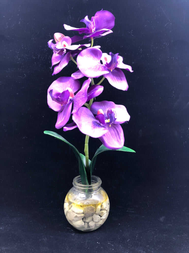 FAUX PURPLE ORCHID IN GLASS PLANTER.