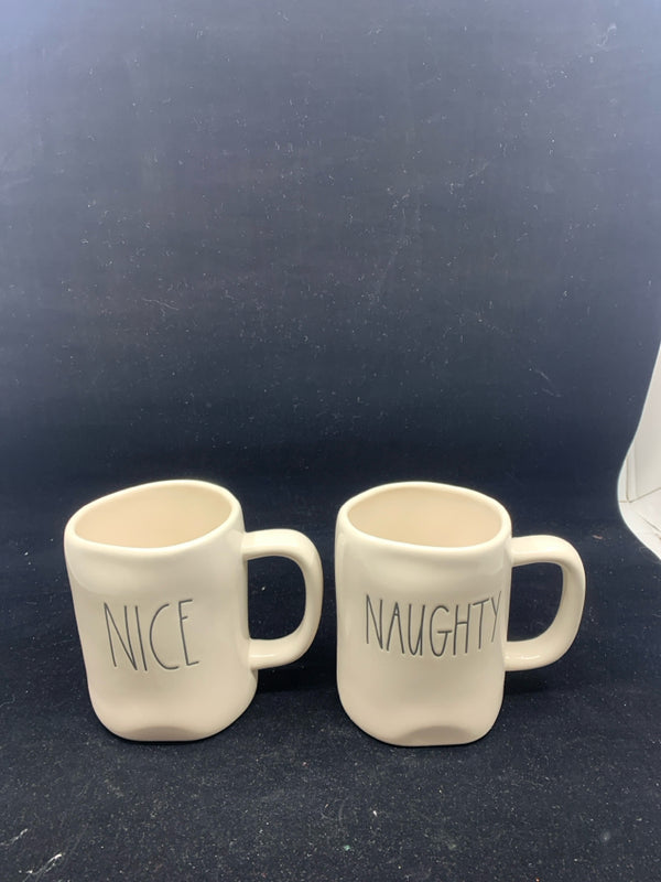 2 RAE DUNN NAUGHTY AND NICE MUGS.