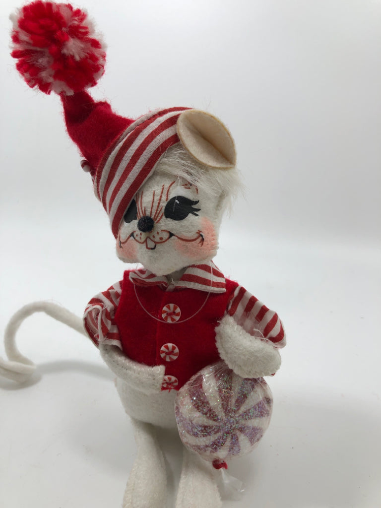 MOUSE DRESSED AS CANDY CANE.