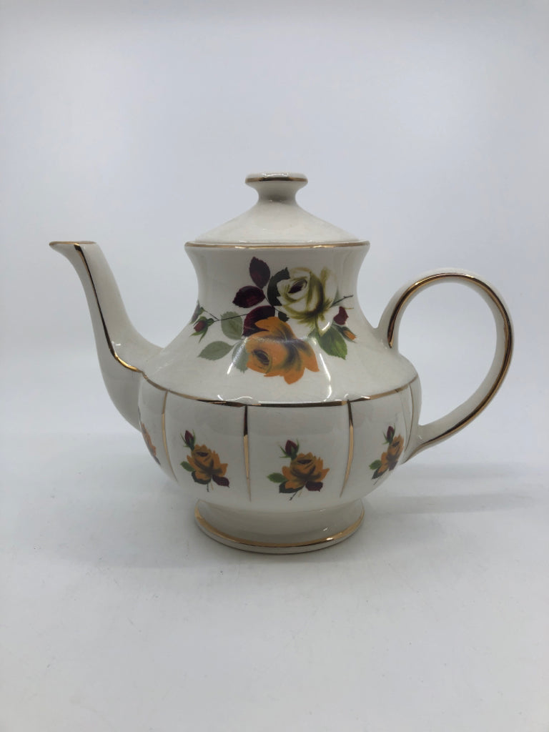 VTG YELLOW FLORAL W GOLD ACCENT TEAPOT.