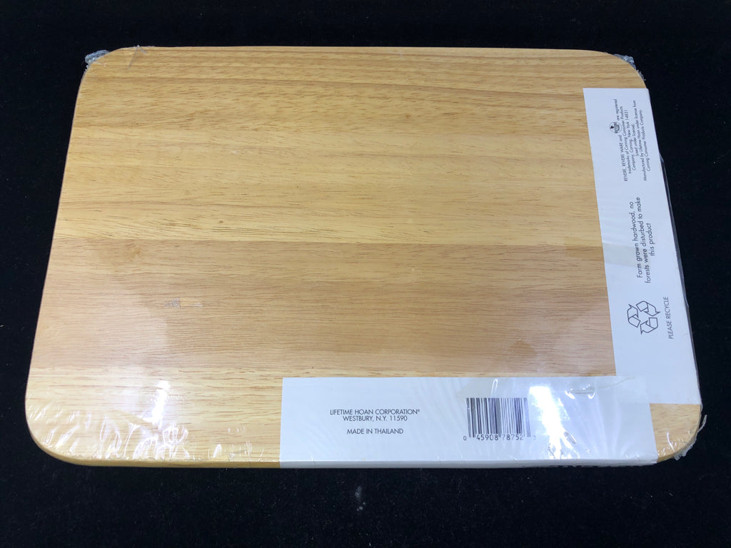 NIP REVERE DOUBLE SIDED CUTTING BOARD.