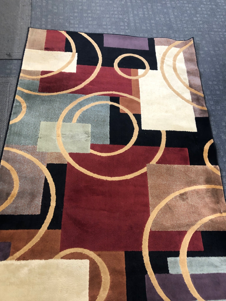 MULTI-COLORED CONTEMPORARY SHAW LIVING RUG.