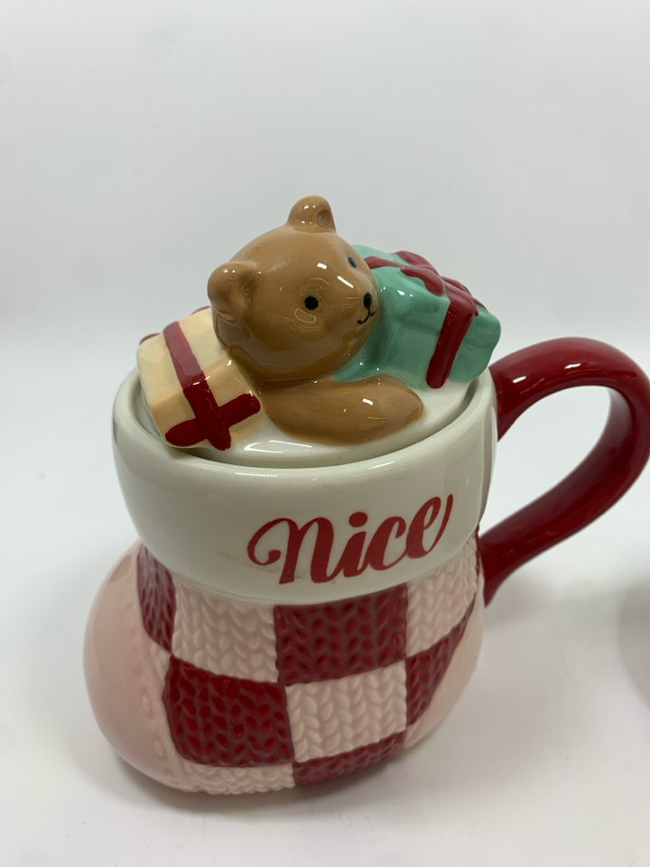 2 NICE/NAUGHTY MUGS W/LIDS.