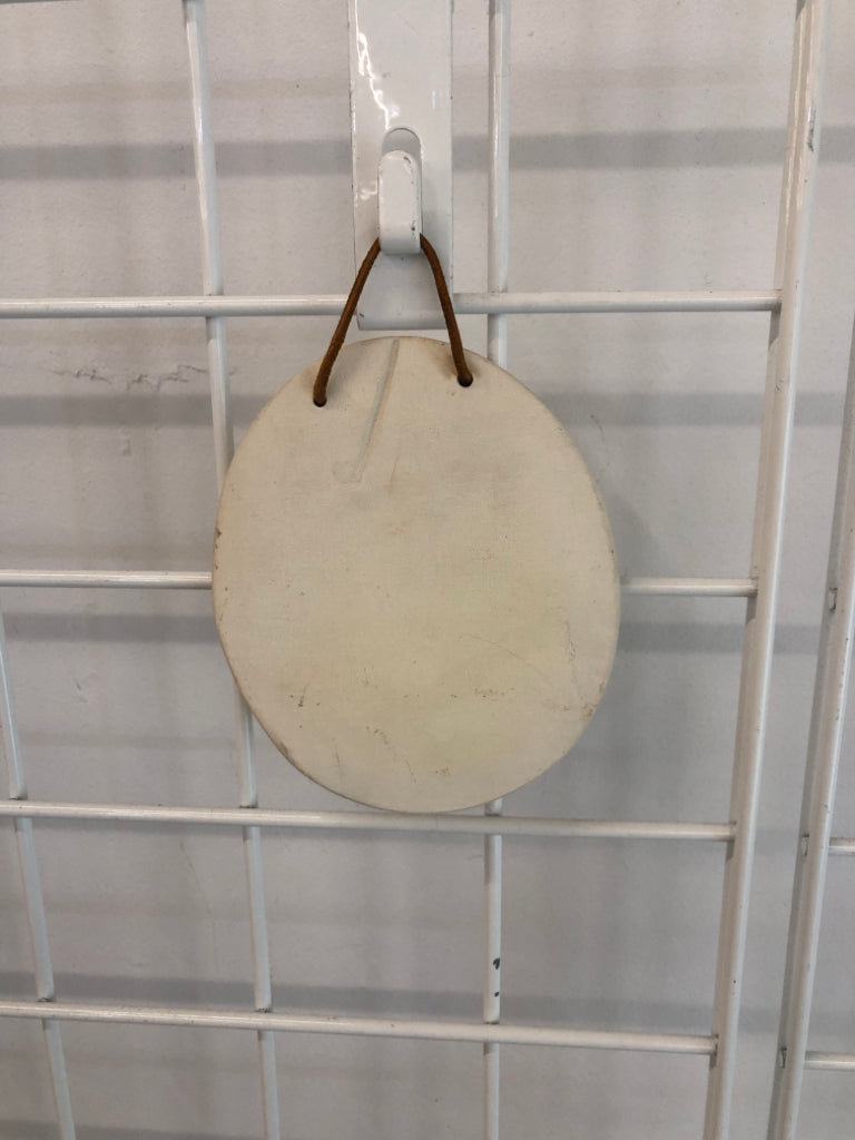 COLORED PRESSED FLOWER HANGING.