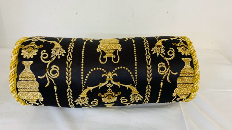 BLACK AND GOLD CYLINDER PILLOW.