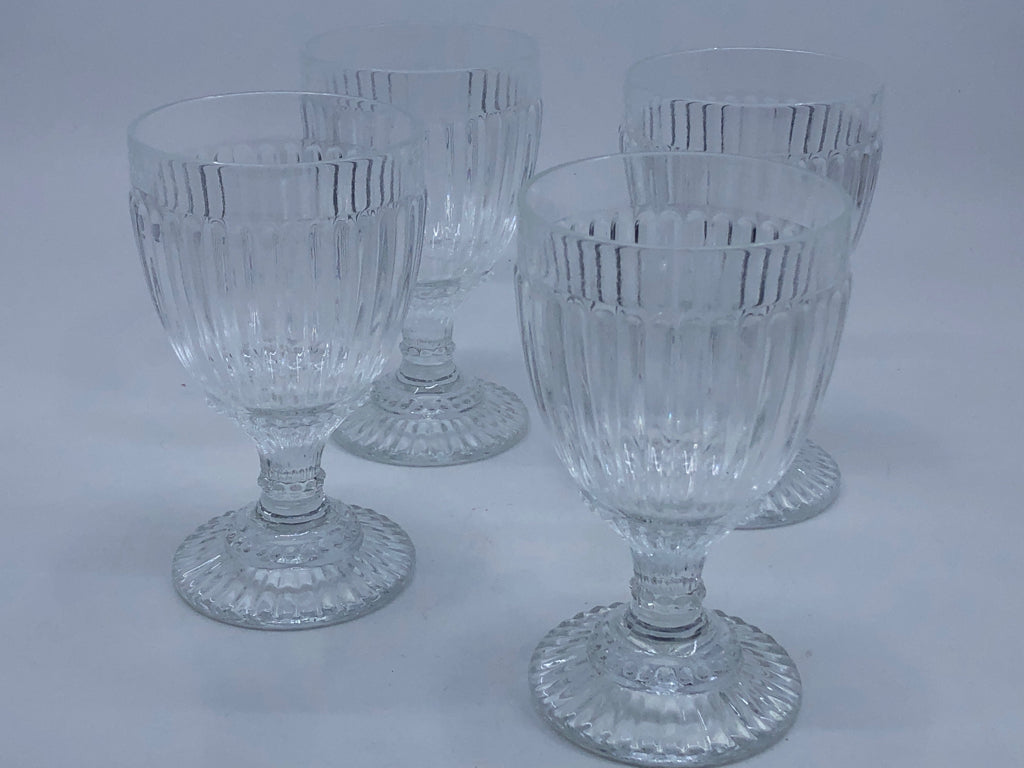 4 RIBBED FOOTED DESSERT GLASSES.