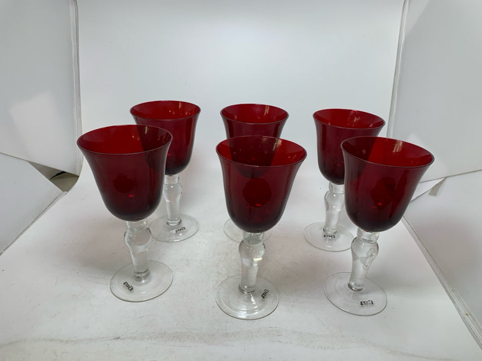6 RED WINE GOBLETS W/ CLEAR STEMS.