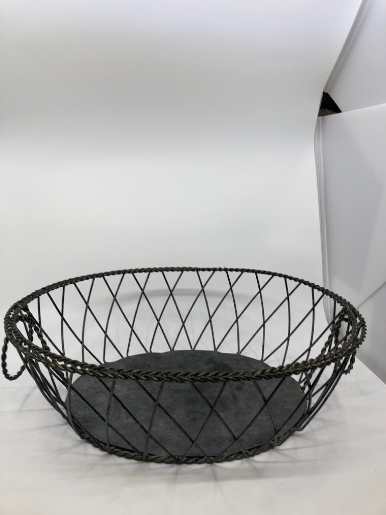 DISTRESSED METAL OVAL BASKET W HANDLES.