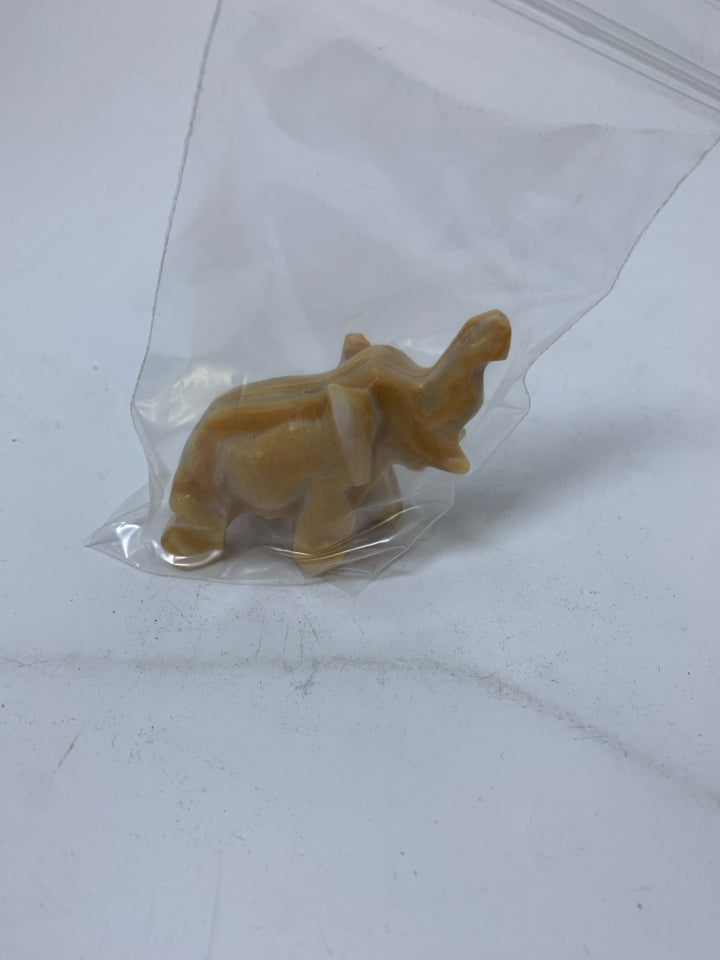 STONE CARVED ELEPHANT IN BAG.