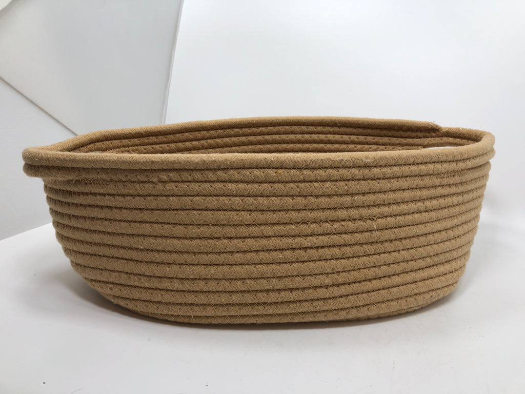 TAN OVAL FABRIC BIN W/HANDLES.