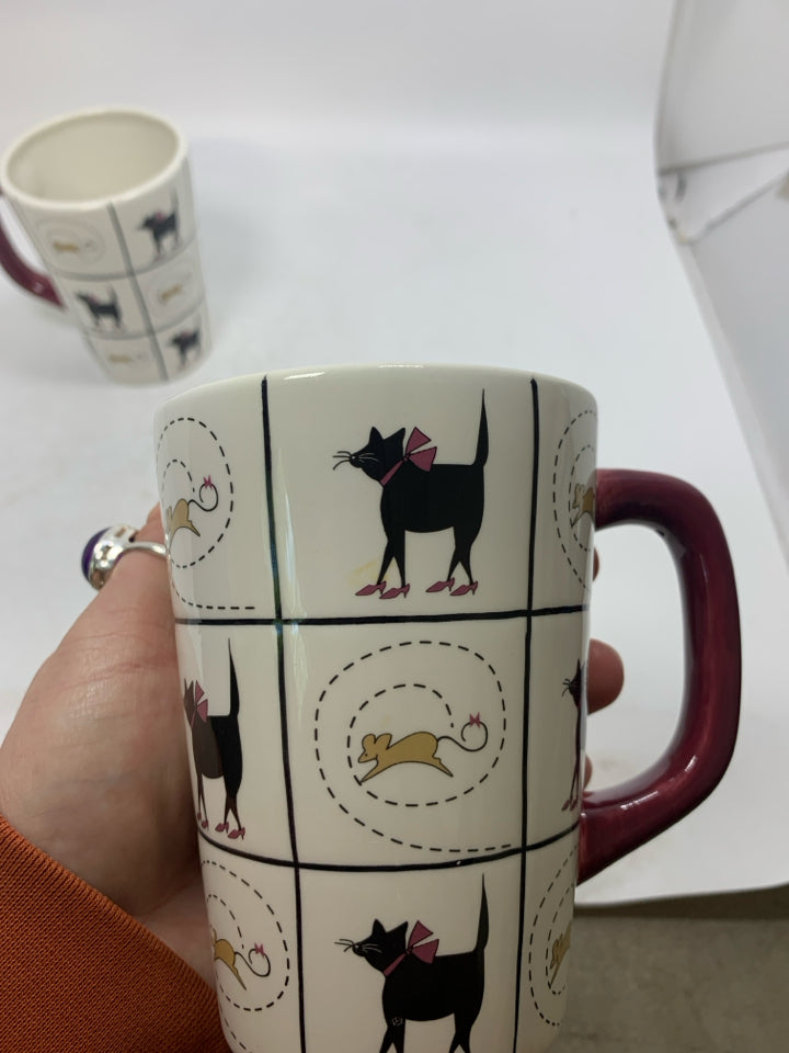 2 BLACK CATS W/ HEELS AND MICE DETAILED MUGS.