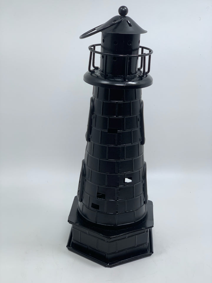 BLACK METAL LIGHTHOUSE TEA LIGHT HOLDER.