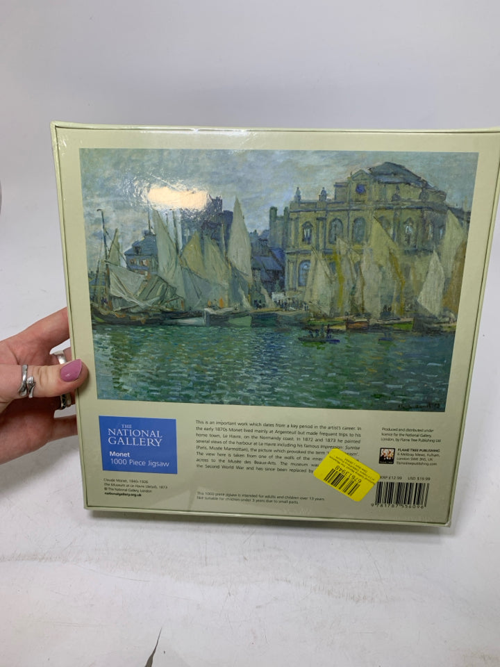 ABSTRACT BOATS ON WATER SCENE W/ CITY IN BACK PUZZLE.