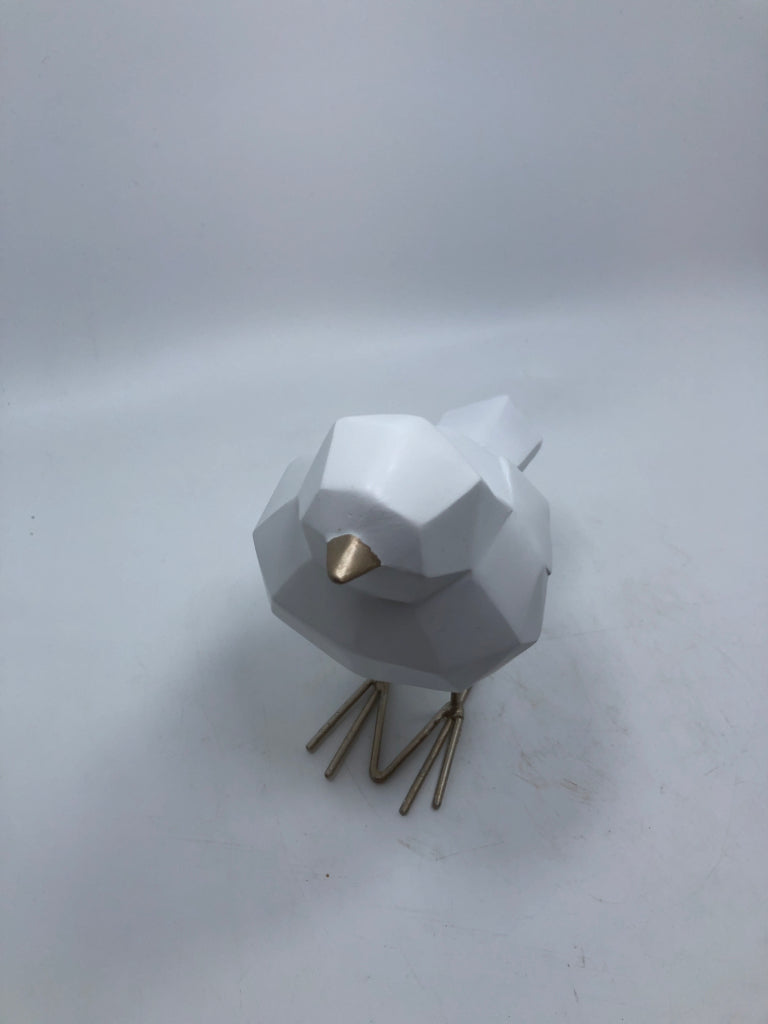 WHITE PLASTIC BIRD W/GOLD FEET.