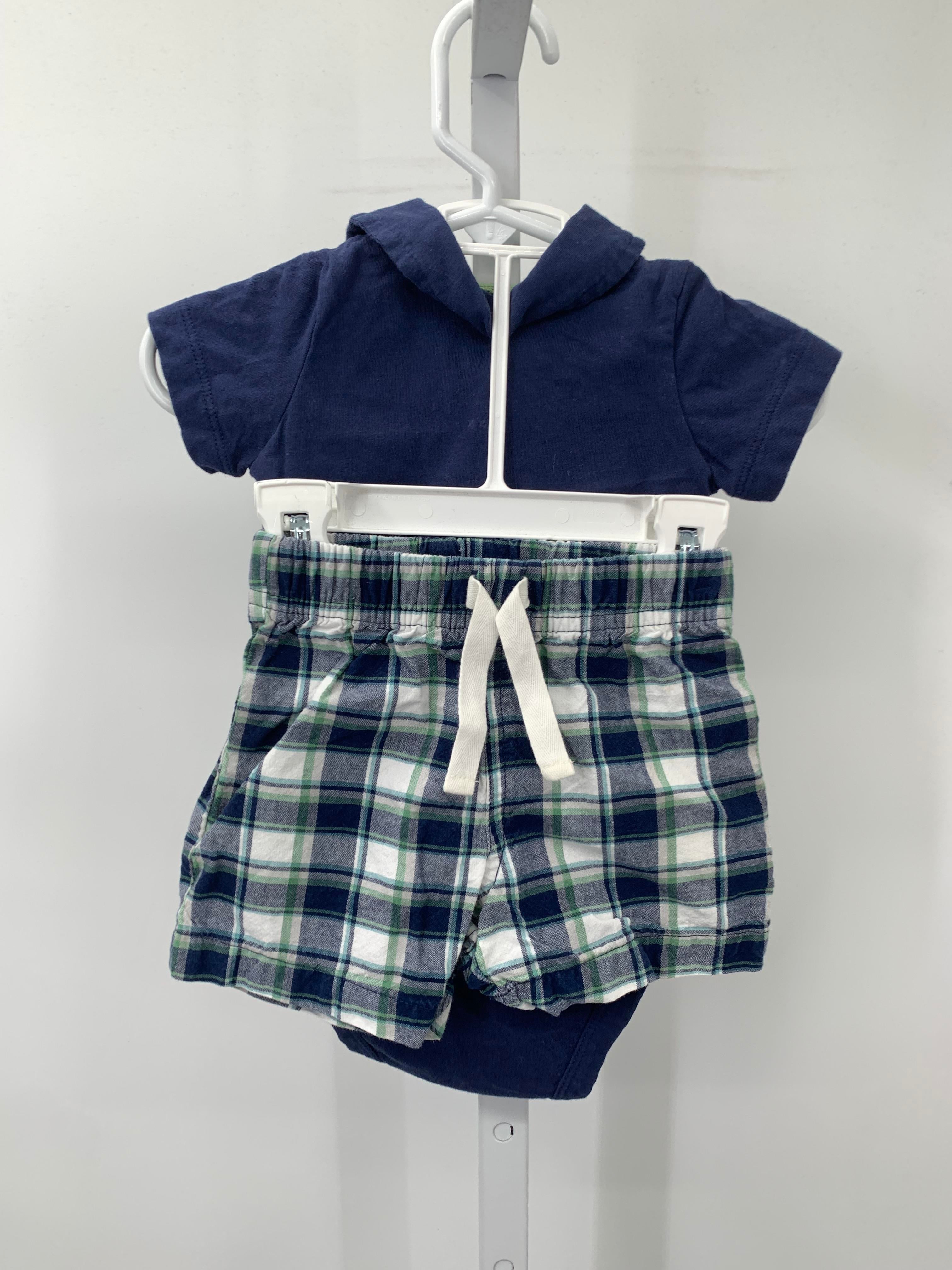 POLO SHIRT AND PLAID SHORTS