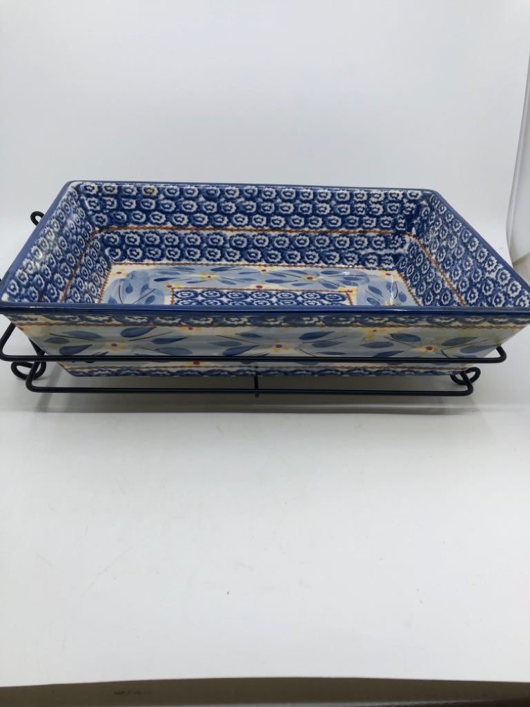 STONEWARE CASSEROLE IN METAL HOLDER.