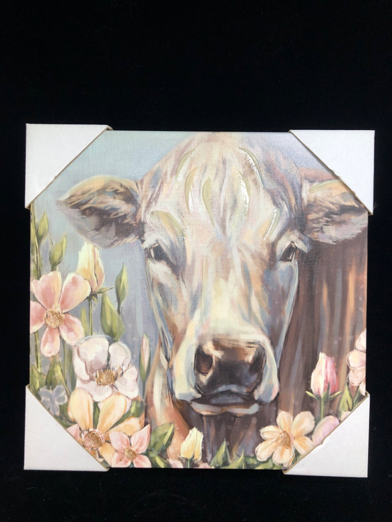 COW W/WHITE FLOWERS TEXTURED CANVAS.