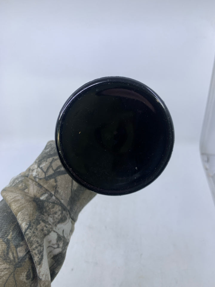 DARK PURPLE THUMBPRINT FOOTED SWUNG VASE.