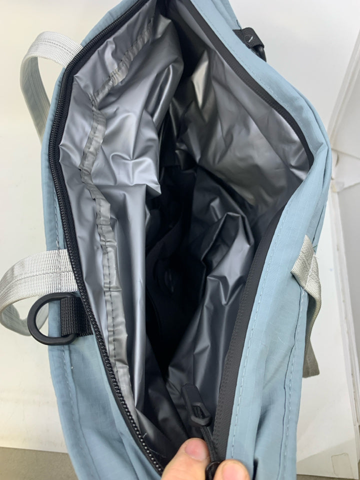 NEW PALE BLUE COOLER BAG W/ GREY HANDLES.