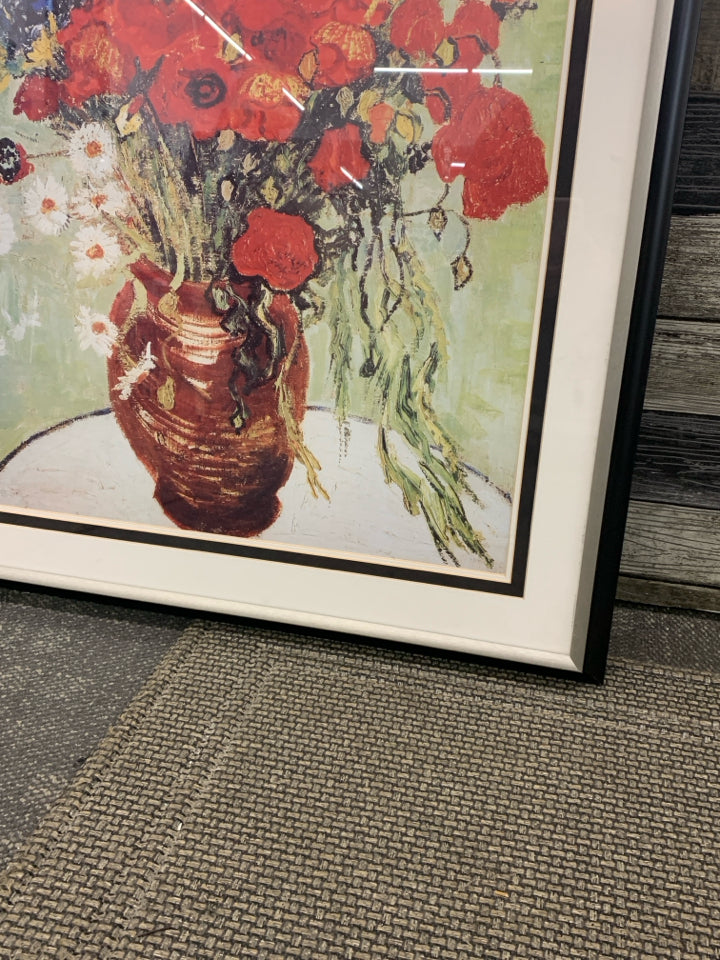 LARGE RED FLORAL BOUQUET PRINT IN BLACK FRAME.