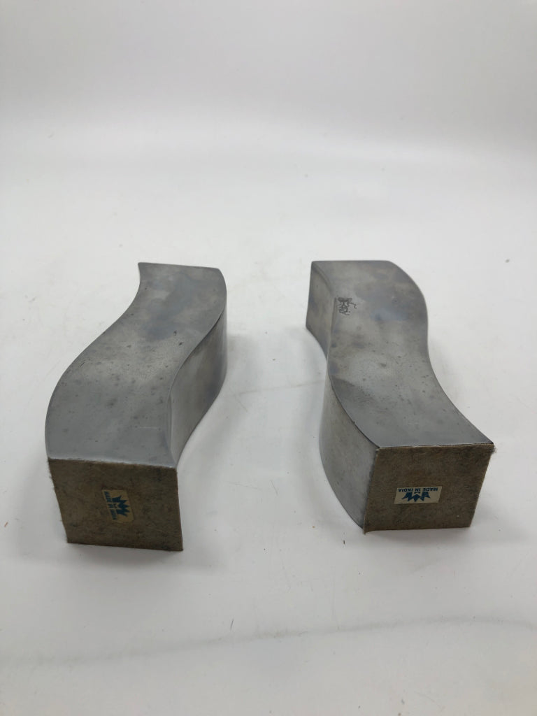 2 CURVY METAL CANDLE STICK HOLDERS.