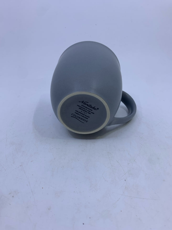 GRAY STONEWARE MUG.
