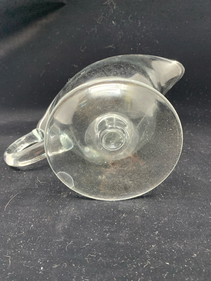 FOOTED GLASS GRAVY BOAT W SPOON.