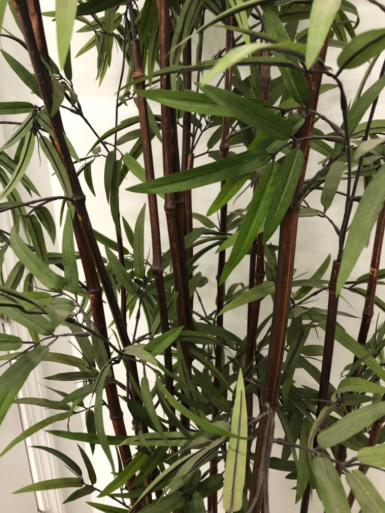 TALL FAUX BAMBOO PLANT IN HEAVY VASE.