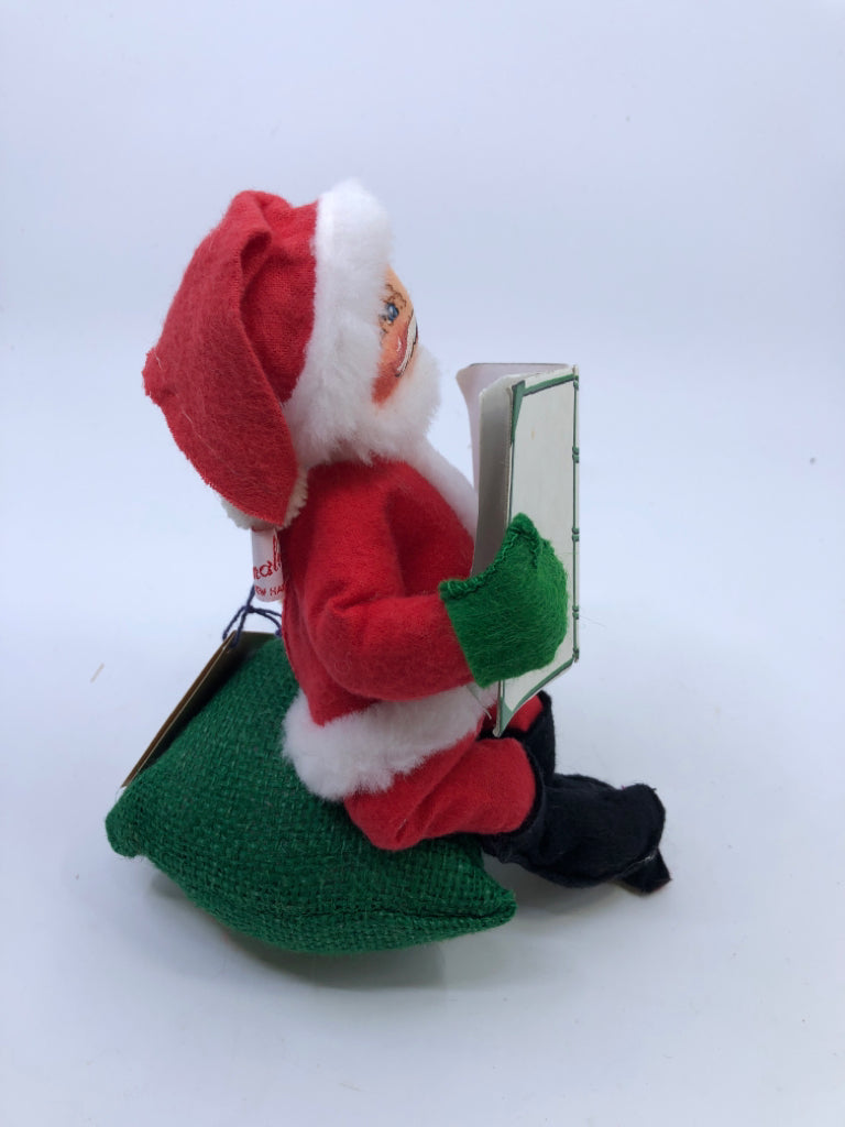 ANNA LEE SANTA HOLDING NAUGHTY NICE BOOK.