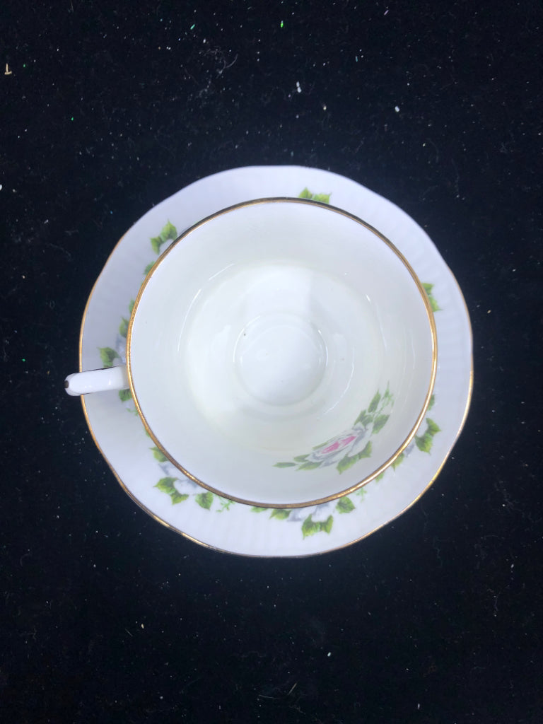 VTG WHITE AND PINK ROSE TEA CUP AND SAUCER.