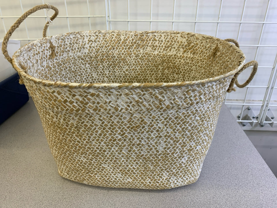 CREAM AND BROWN OVAL BASKET W HANDLES.