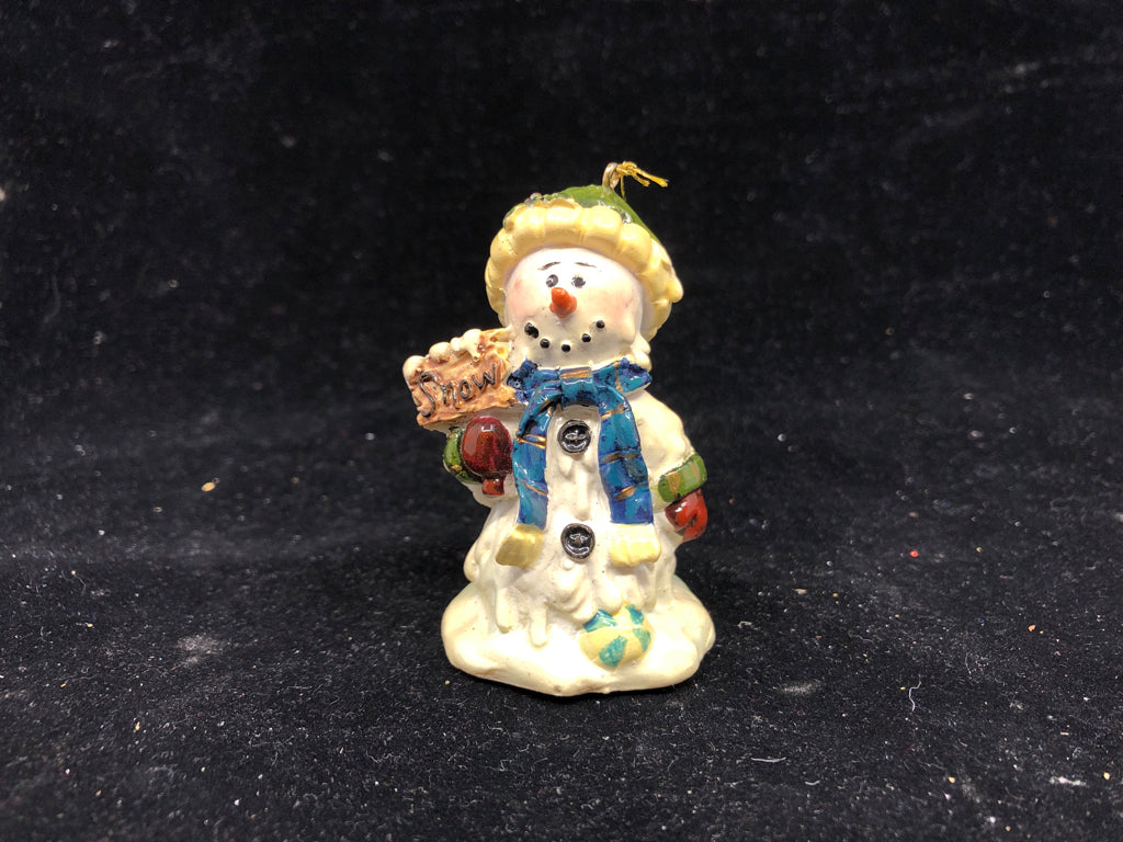 SNOWMAN HOLDING SNOW SIGN ORNAMENT.