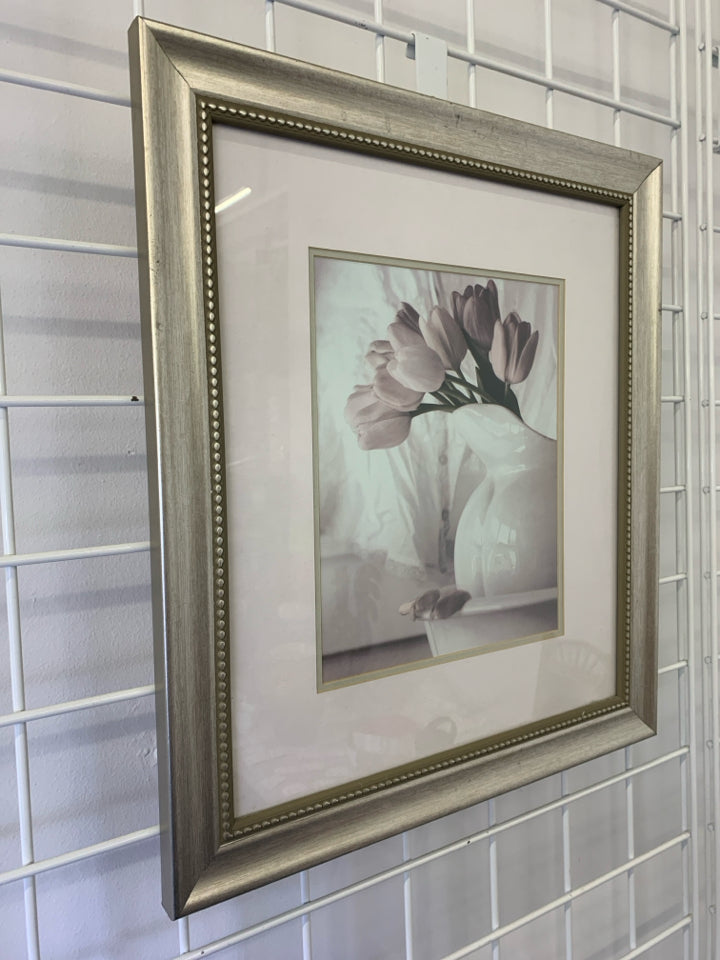PINK TULIPS IN WHITE VASE IN SILVER FRAME.